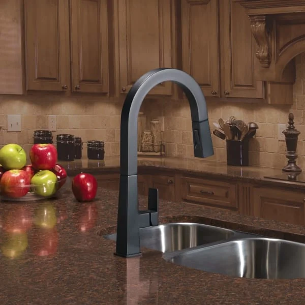 RV kitchen accessories including a kitchen sink and faucet
