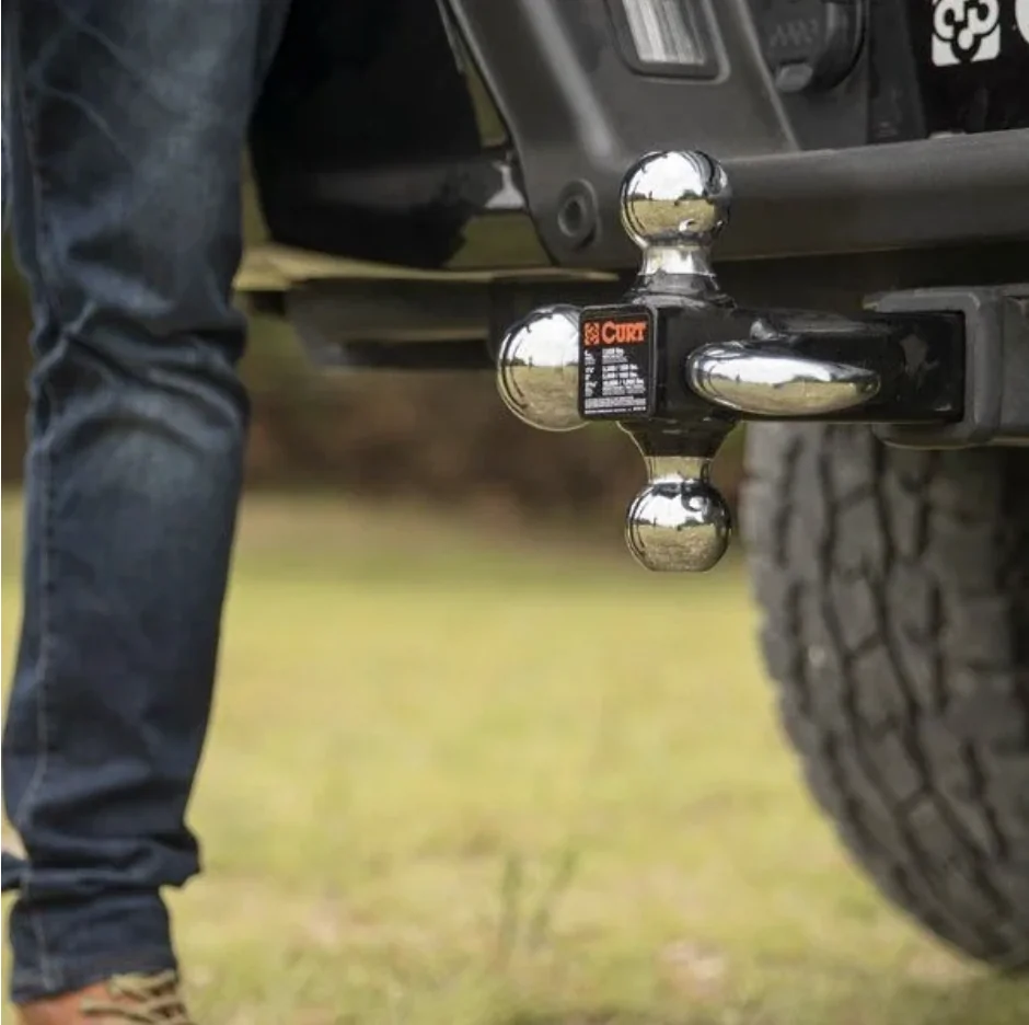 CURT multi-ball hitch with three trailer balls and tow hook