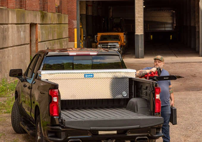 Crossover truck tool box
