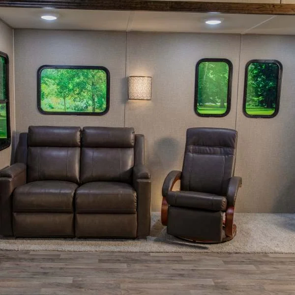 Wall-hugger RV recliners next to an RV swivel recliner