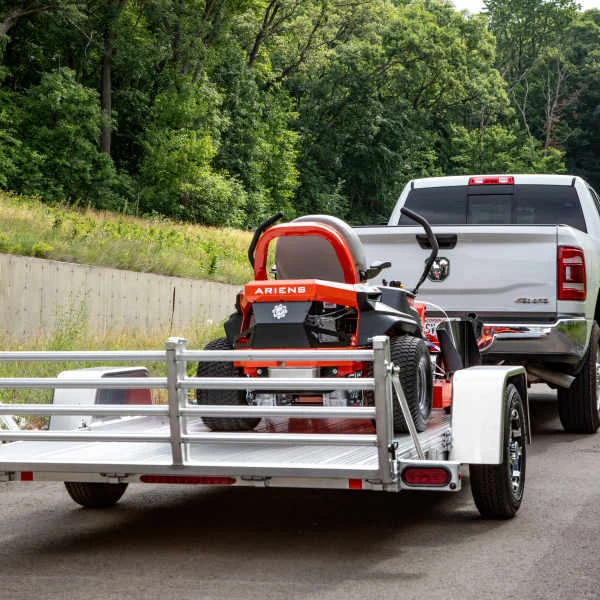 Truck hauling single-axle utility trailer