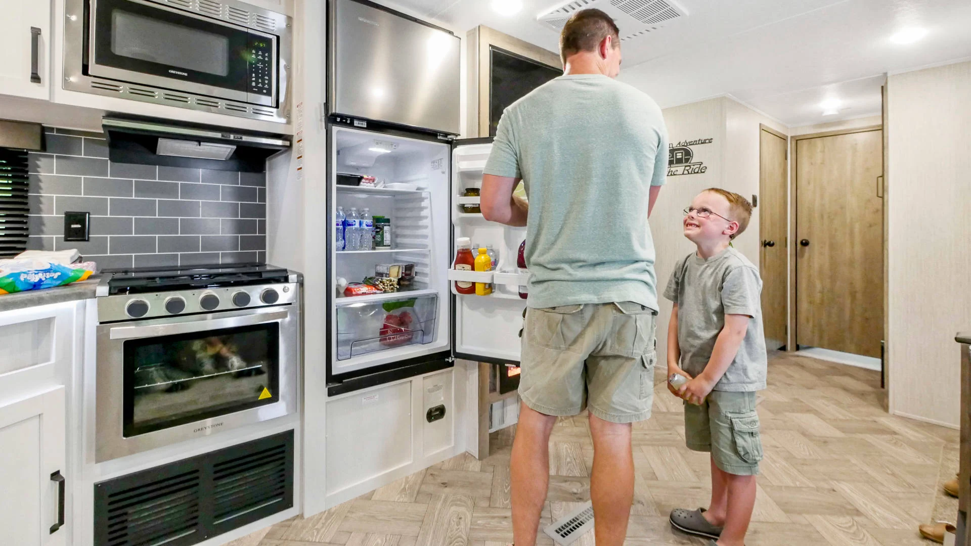 Travel Trailer Fridge Kitchen Father Son