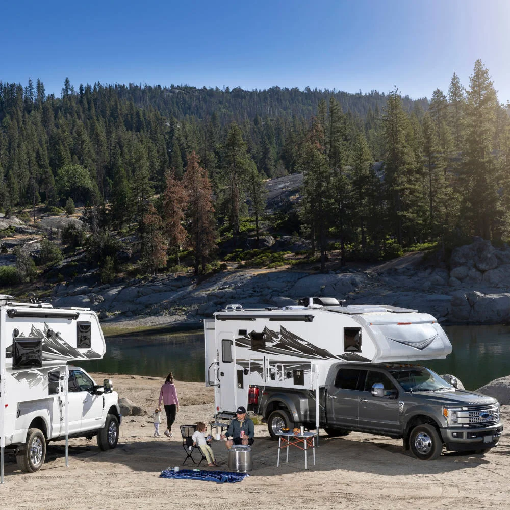 Truck Campers Parked Camping River