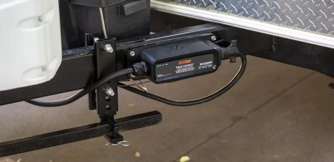 Closeup of CURT True Coarse Electronic Sway Control on the A-Frame of a Trailer
