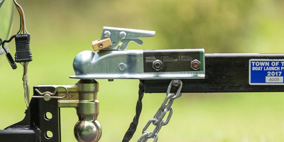 Close-up of Boat Trailer Coupler Connecting Boat Trailer to Tow Vehicle Close-up of Boat Trailer Coupler Connecting Boat Trailer to Tow Vehicle