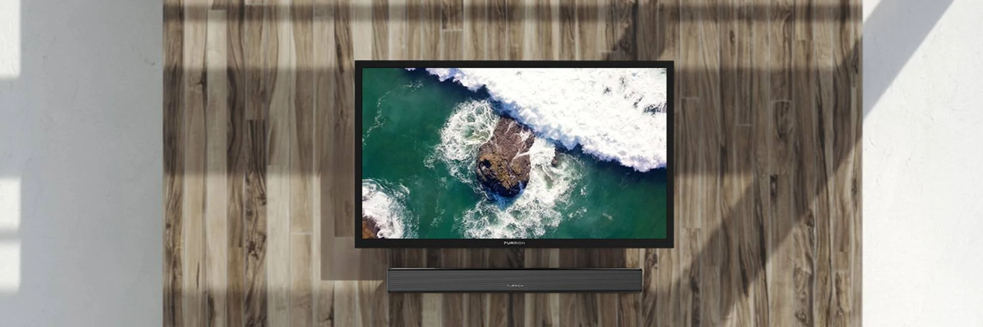Boat TV and Soundbar on an Outdoor Wall