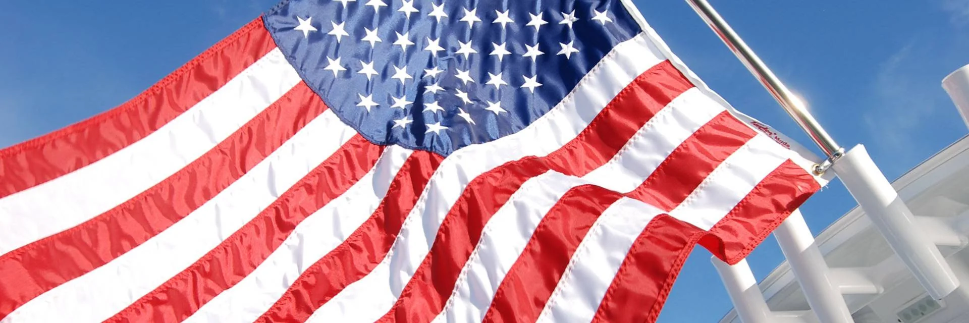 American Flag Flying on Boat Flag Pole in Rod Holder on Boat T-top