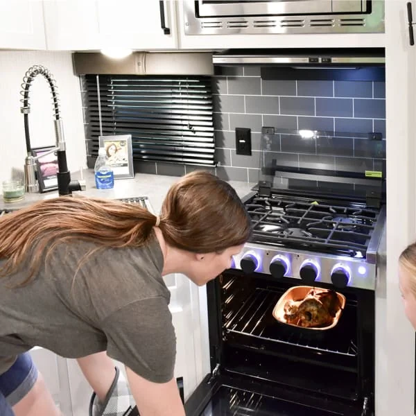 RV Oven Cooking Chicken for Camp Dinner