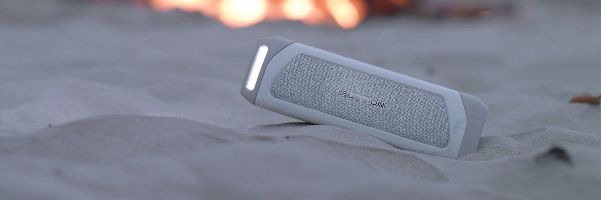 Furrion Bluetooth Speaker on Beach Furrion Bluetooth Speaker on Beach