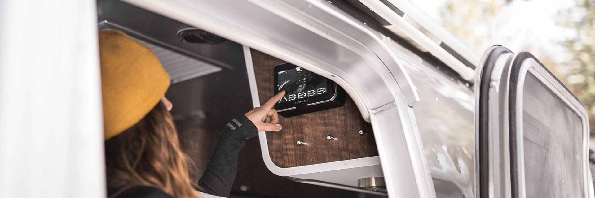 Woman using rv distribution panels