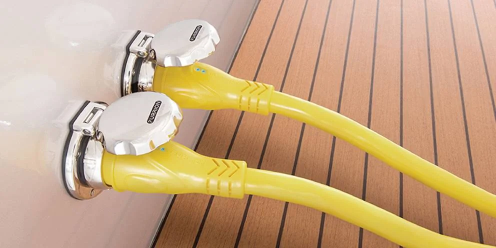 Shore Power Cords Plugged into Marine Power Inlet Ports on Boat Shore Power Cords Plugged into Marine Power Inlet Ports on Boat