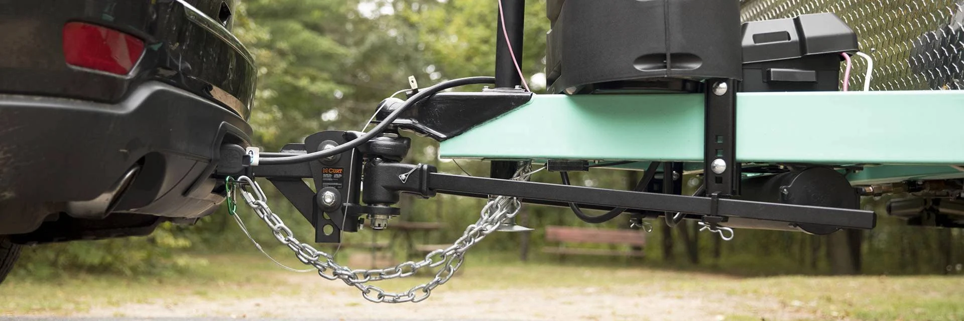 CURT weight distribution hitches level your tow and improve safety.