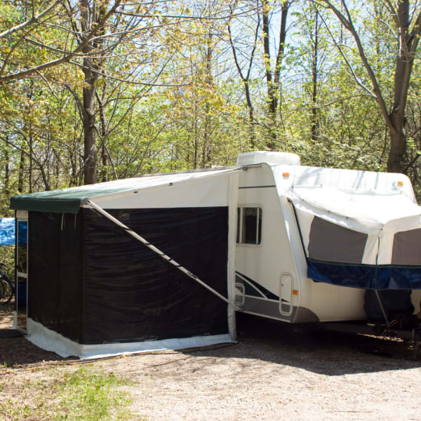 Popup camper with full screen room shade