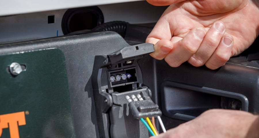 Factory towing package with trailer wiring plug