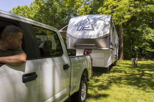 Pickup Truck Backing up to Fifth Wheel Trailer