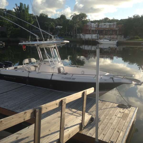 Center console boat at dock