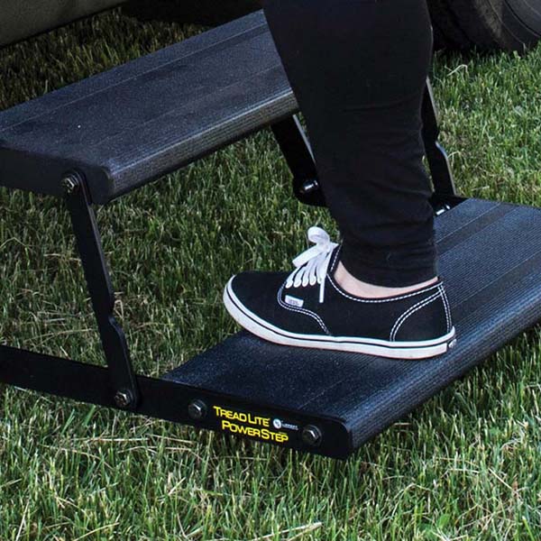 Person stepping on standard RV steps