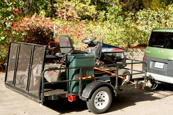 Utility Trailer with Lawn Mower
