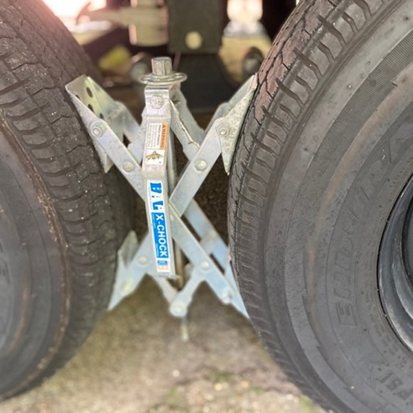X-Chocks holding RV tires in place