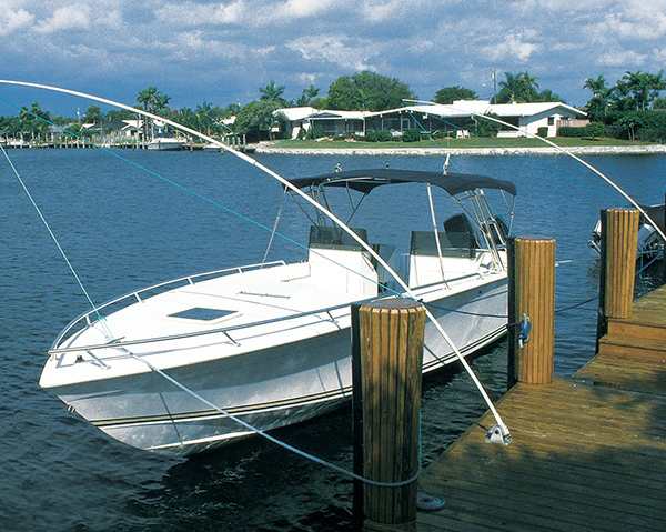 Boat moored at the boat dock using mooring whips Boat moored at the boat dock using mooring whips