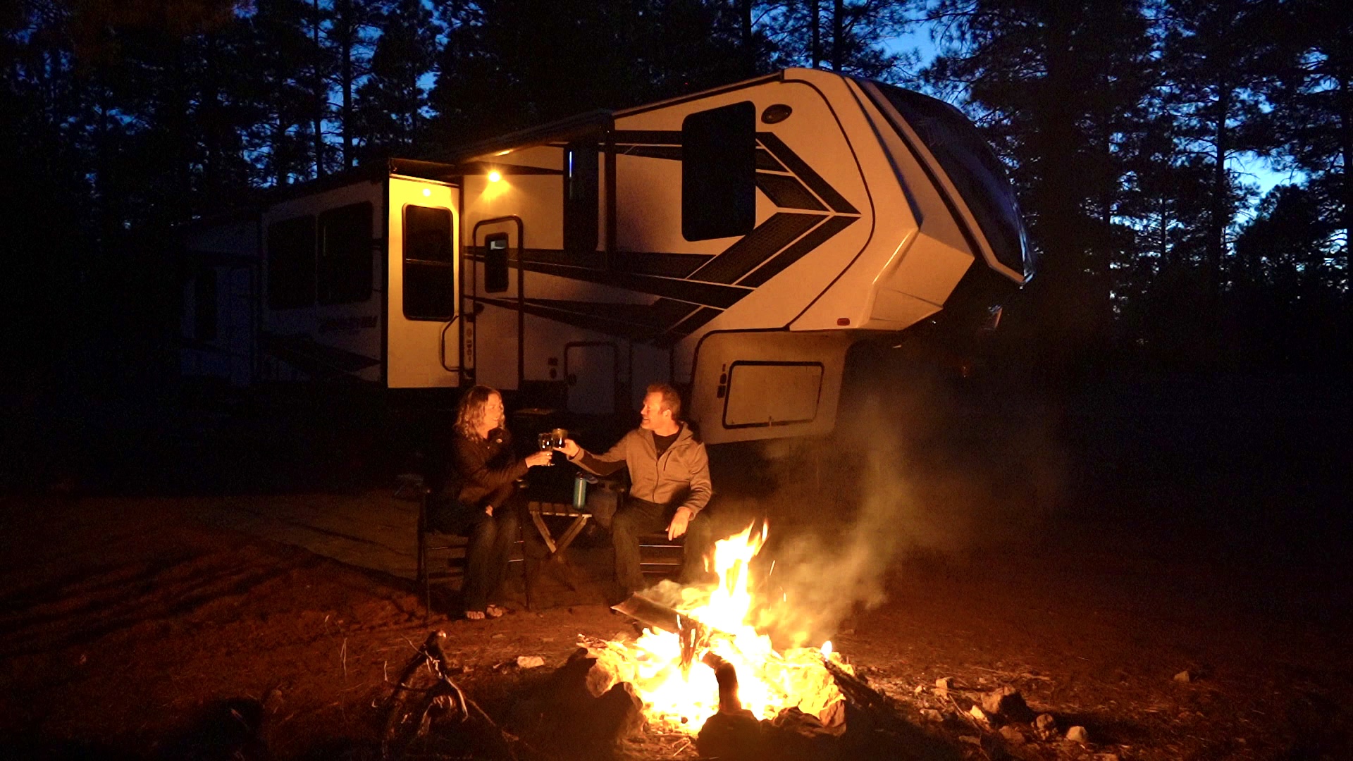Enjoy the Journey toasting by the campfire